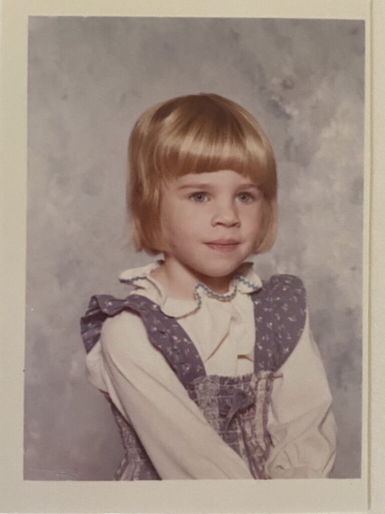 Child with unexpressive face — representing lost autistic girls and missed diagnoses.